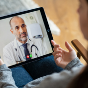 Patient receiving medical treatment and ongoing care in a modern healthcare facility.